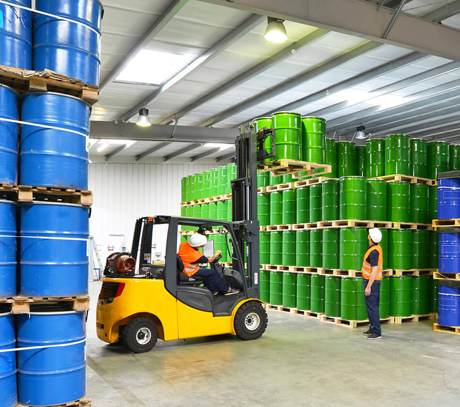Image of forklifts and chemical containers