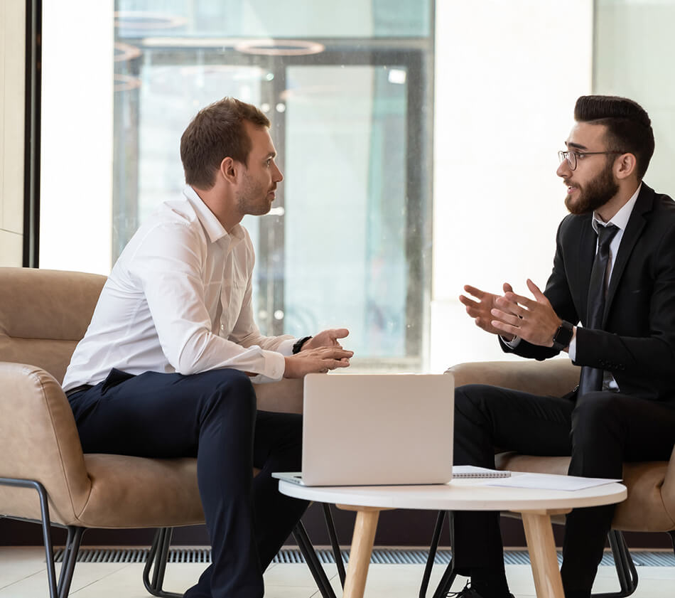 Image of two businessmen having a meeting.
