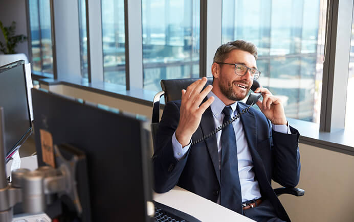 Image of man on a phone